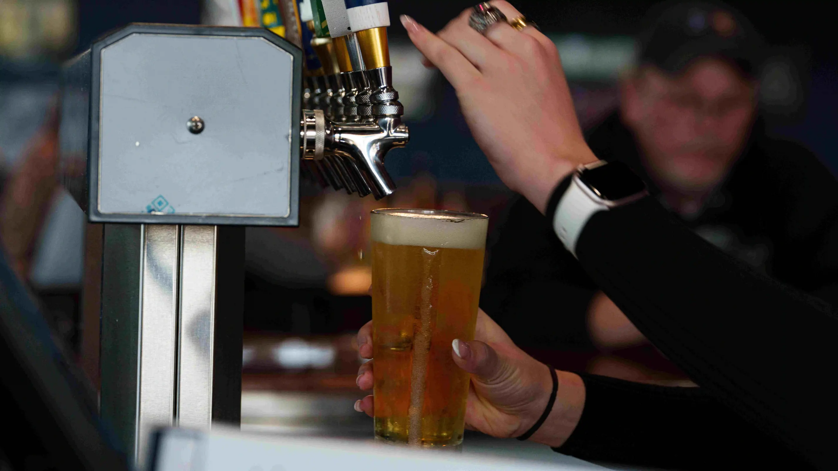 A row of beer taps at Avenue Sports Grill