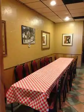 Private party room entrance with wooden doors