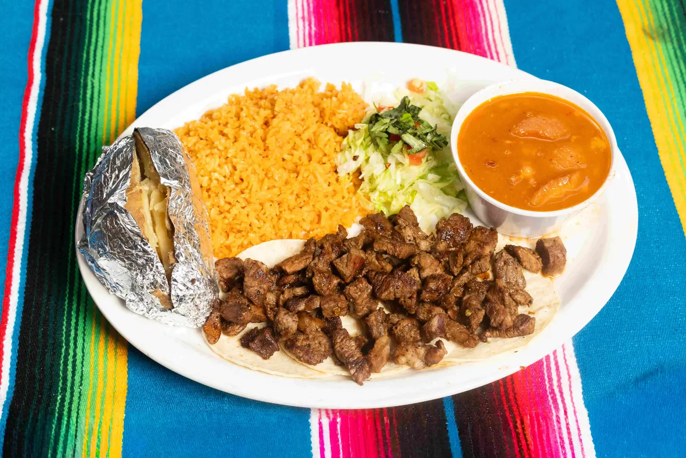 A group of friends laughing and dining together