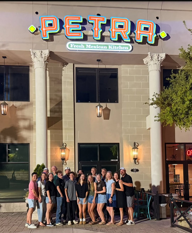 A vibrant and lively dinner scene at Petra.