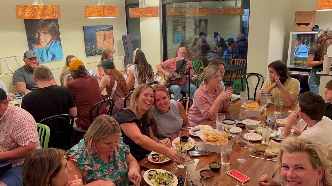A vibrant and lively dinner scene at Petra.